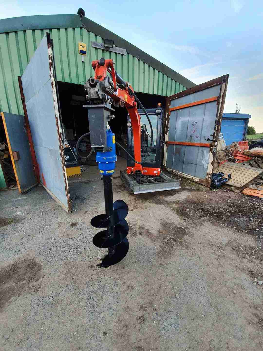 Auger Torque X2500 mini digger auger package on a Kubota KX016