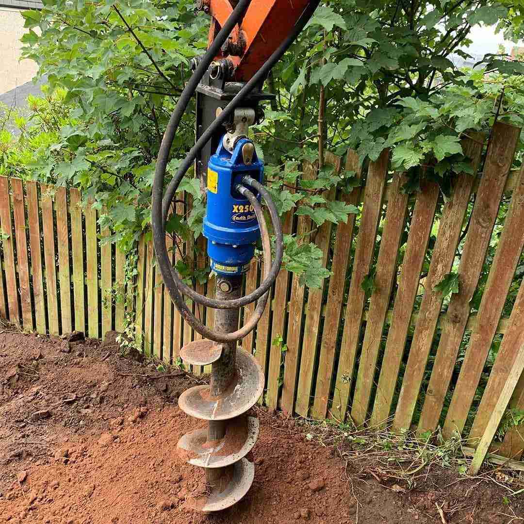 Auger Torque X2500 mini digger auger package on a Kubota KX016