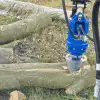Excavator log splitter attachment for Takeuchi mini digger