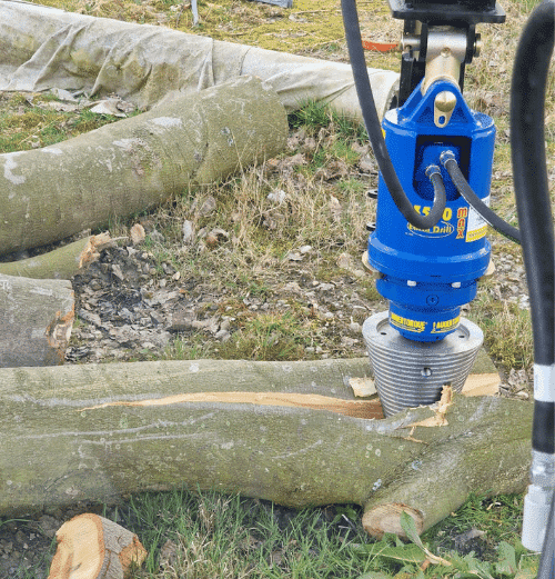 Excavator log splitter attachment for Takeuchi mini digger